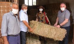 Bir yardım kampanyası da Germencik'ten! Manavgatlı üreticilere saman yonca yardımı