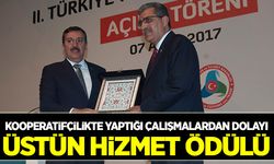 Recep Konuk’a üstün hizmet ödülü